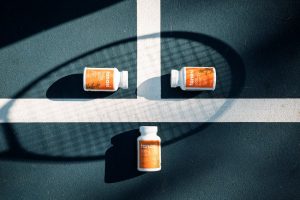 CBD pills on a tennis court
