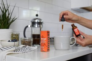 Using Tanasi CBD tincture in morning coffee