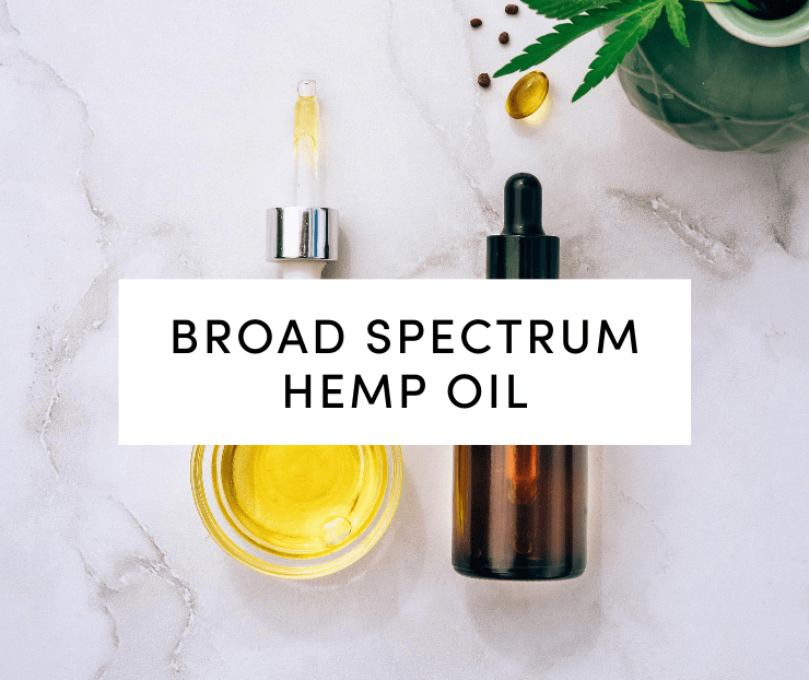 Broad spectrum hemp oil: hemp products on marble background