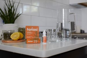 Tanasi CBD water soluble on kitchen counter