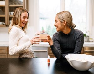 Women drinking alcohol with cbd water soluble