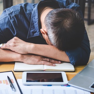 Does CBD Affect REM Sleep? - Tired man after not having enough REM sleep last night