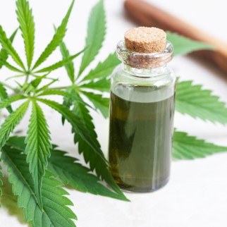 Does CBD Oil Have THC In It? - cbd oil and cannabis leaf