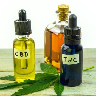 CBD Oil With THC - jars filled with cbd and thc