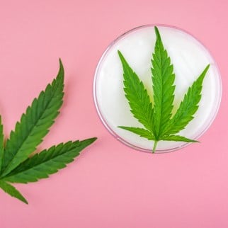 CBD Beauty Products - cbd cream with a cannabis leaf on top