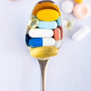 CBD And Antidepressants - spoonful of antidepressant pills